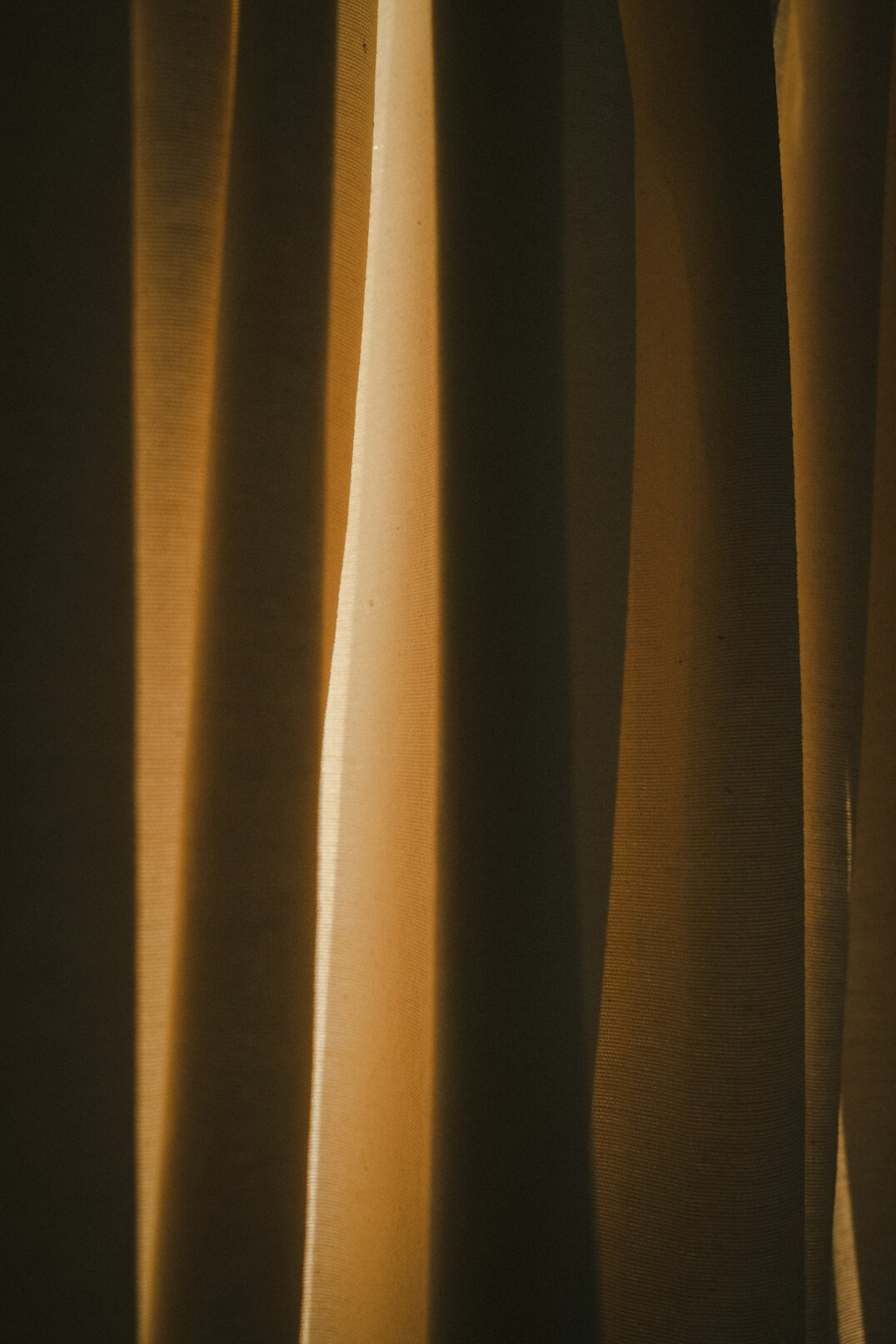 Theater stage curtains with warm spotlight